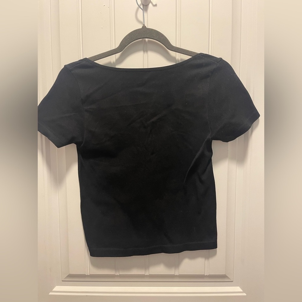 Elodie
Womens size Large
NWT
Black Women's Top - Picture 2 of 3